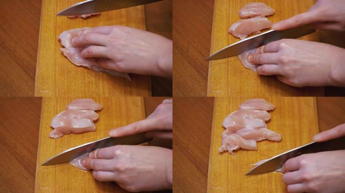 手切鲜肉，在厨房板上切肉，切生肉