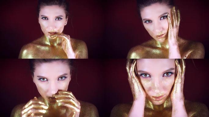 4k摄影棚拍摄的金色闪闪发光的身体女人擦脸