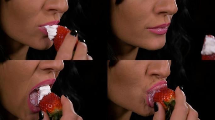 性感的年轻女子在慢动作中吃草莓加奶油浇头的特写镜头
