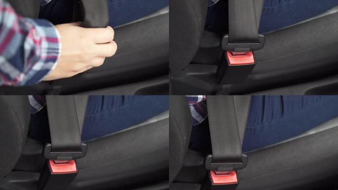 一名妇女在汽车上系好安全带
