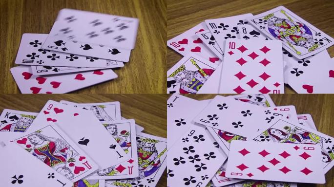 扑克牌在木桌上旋转