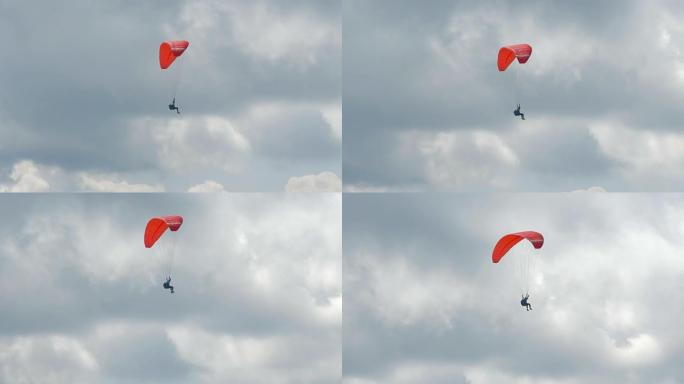 滑翔伞在山上高高飞翔