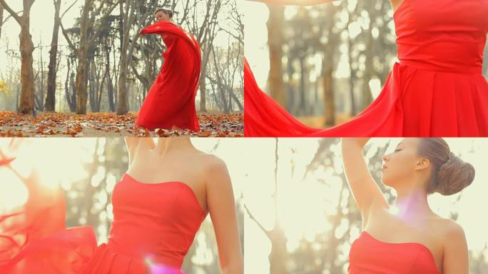 漂亮的年轻模特穿着红色长晚礼服，专业地在相机上摆姿势。