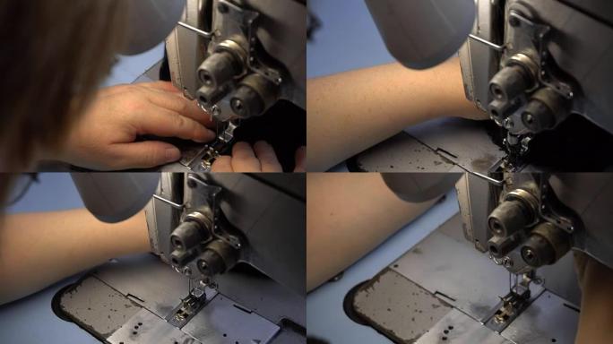 裁缝师用两根针在缝纫机上缝制衣服