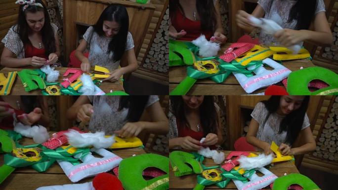 手工女孩缝制毛毡字母