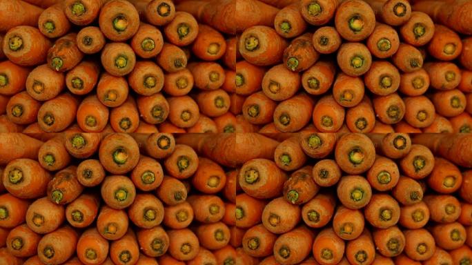 在食品市场上整齐地堆叠在一起的胡萝卜