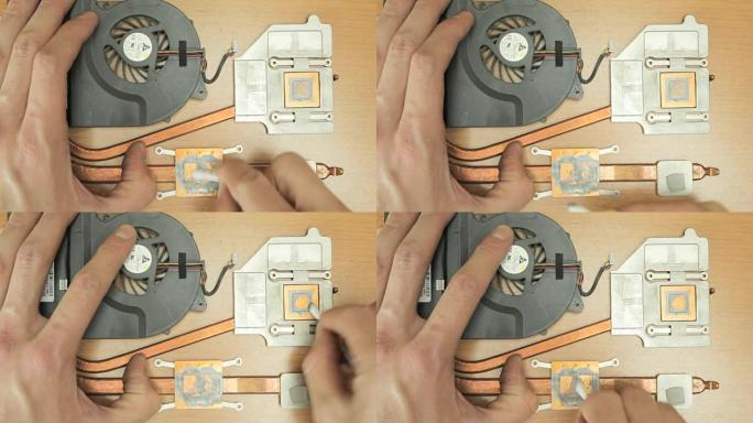 工程师移除旧的导热膏