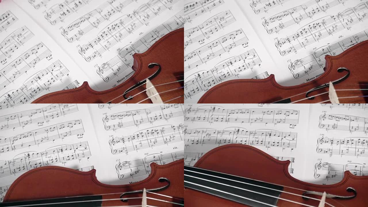棕色小提琴，白色背景上有音符 (旋转和平移镜头)。演示概念。