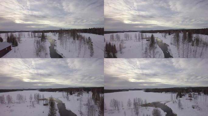 瑞典北博滕市博登市哈拉德村附近的清水和冰冻湖水道的鸟瞰图