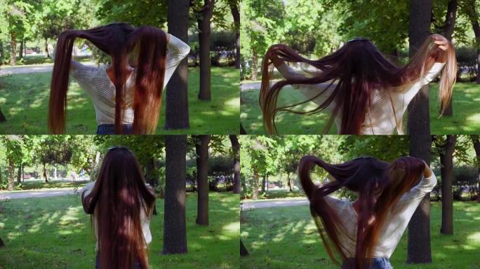 女人在公园里飘扬着奢华的长发