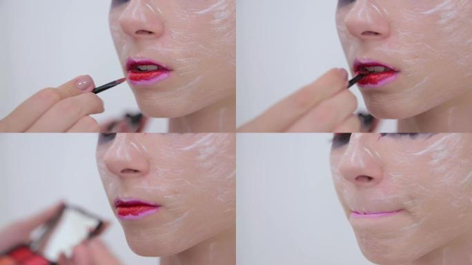 嘴唇绘画: 专业化妆师制作面部化妆艺术