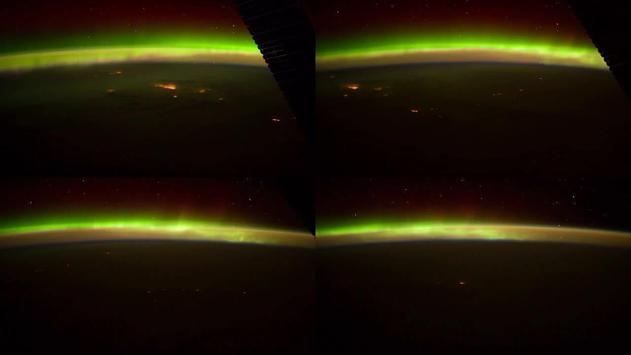 具有城市之光，恒星和极光的地球ISS视图