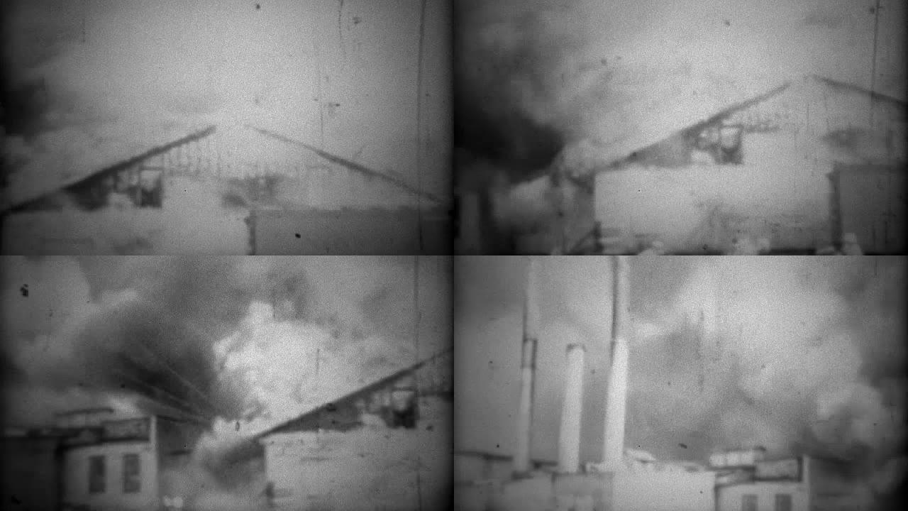 1963: 建筑物被火焰吞没，从屋顶涌出的火烟。