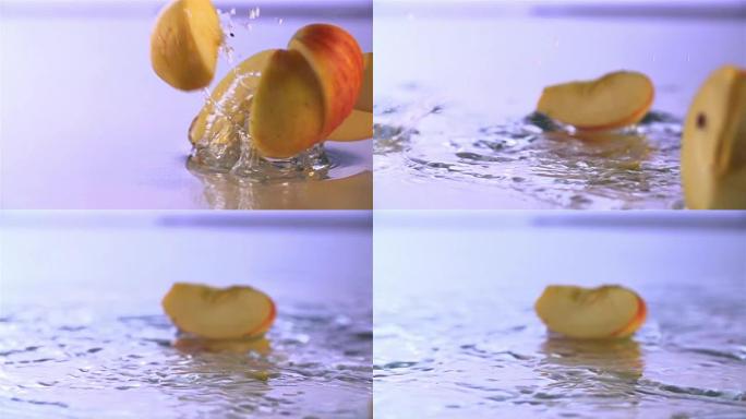 葡萄和苹果落在水面上