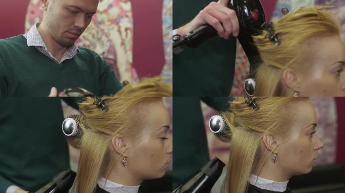 理发师风格的金发女孩头发，用梳子和吹风机在美容沙龙。制作体积发型