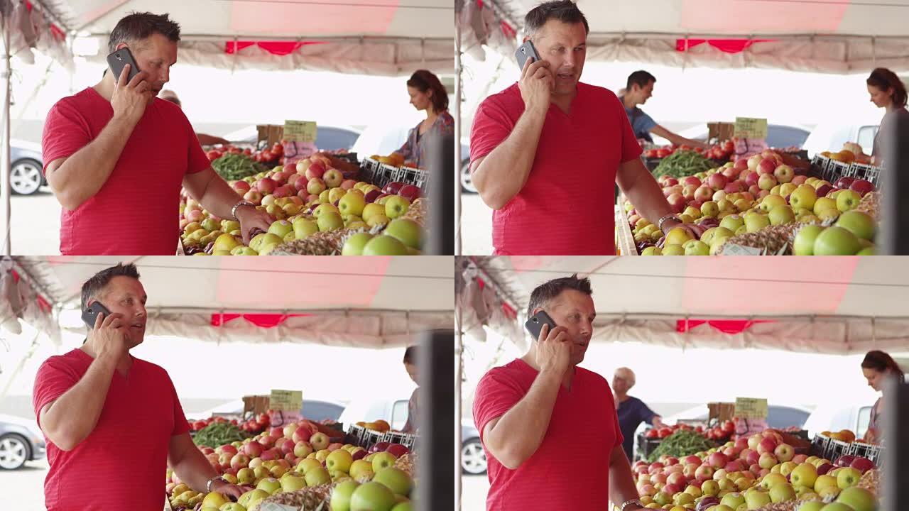 男子在手机上购买新鲜水果