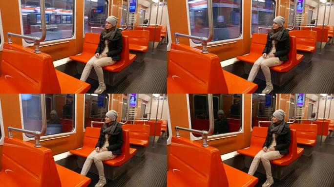 普通疲惫的女人坐在空着的赫尔辛基地铁车厢里