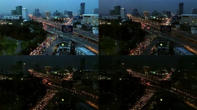 泰国曼谷，2017年4月8日: 泰国曼谷，白天到晚上，在Ladprao路口的道路交通的高角度视图