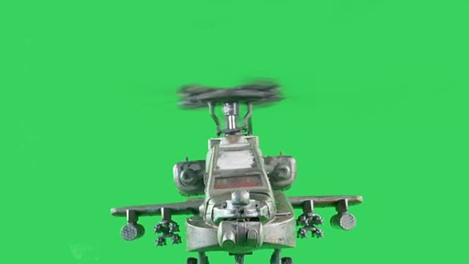 一架武装直升机在绿幕上飞行