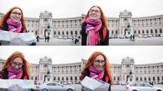 Yong游客-维也纳Heldenplatz红头发和眼镜的女人看地图