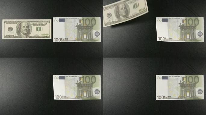 顶视图: 两张纸币躺在一张黑桌子上，然后美元飞走了