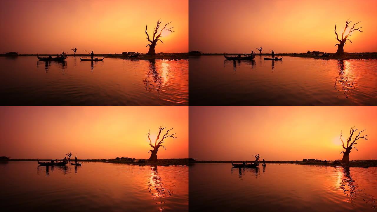 金色的夕阳，小船，一棵树，倒映在河上。