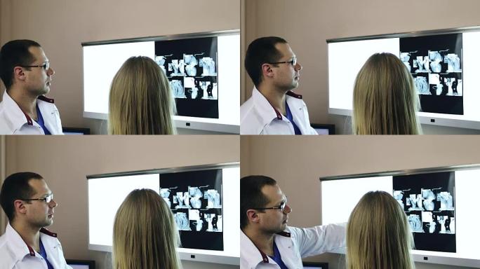 两名医生在诊所或医院讨论并查看x射线照片。