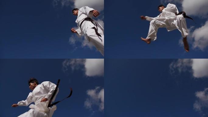 极限运动西班牙裔运动员在空手道比赛中跳跃