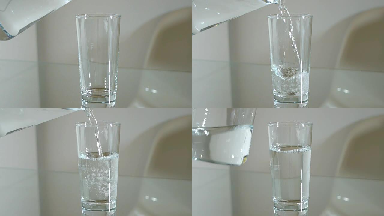 将水罐中的水倒入高高的玻璃杯中