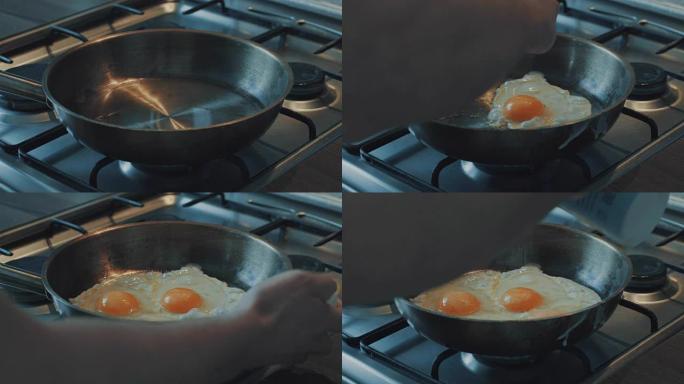 有人在锅里倒油，在那里打碎鸡蛋，然后油炸