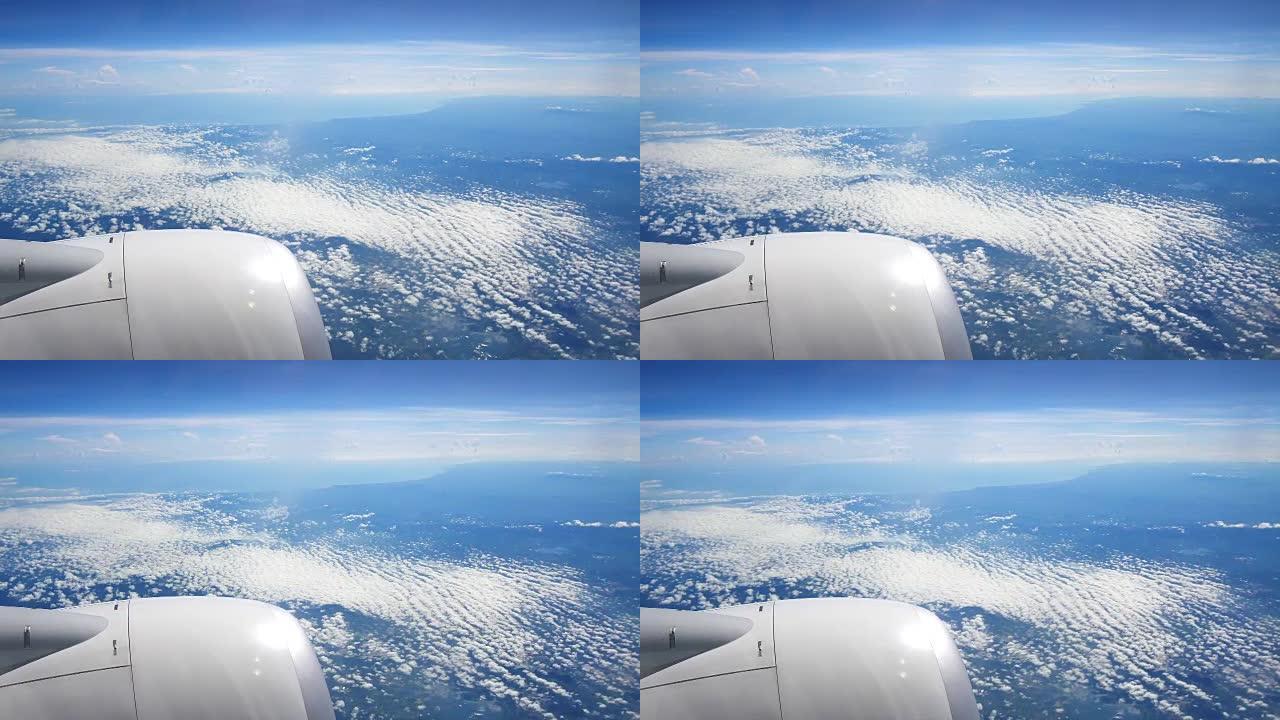 飞机的视野。飞机在云层中飞行。空中旅行概念。