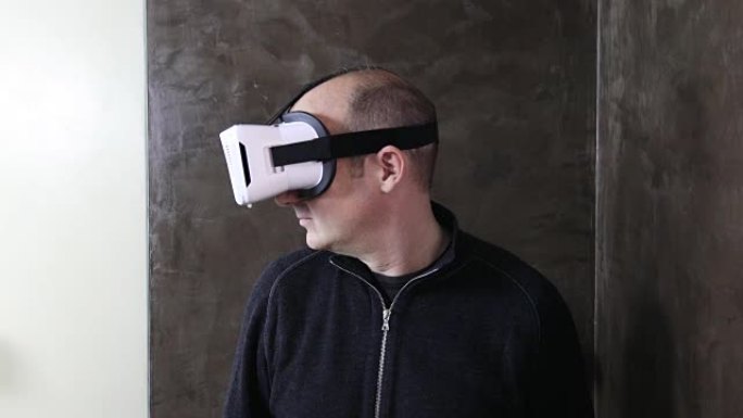 带有VR护目镜导航菜单的男人