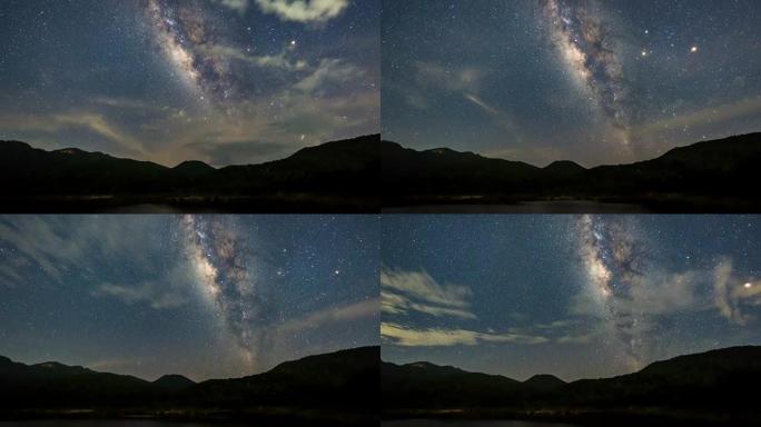 延时-银河系在水库上空，夜空如山。(pan shot)