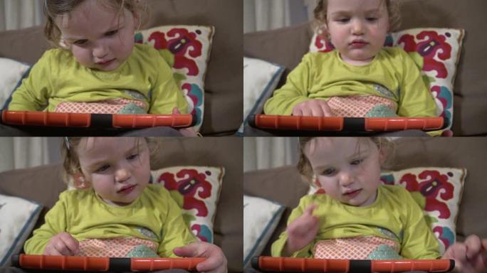 儿童观看和与触摸屏平板设备互动