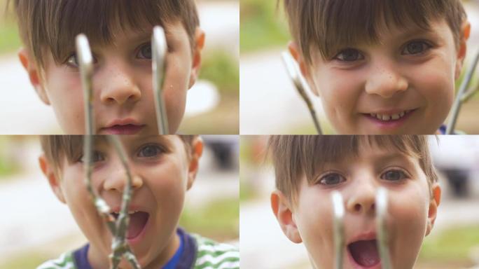 一个快乐微笑可爱的小男孩玩钳子的肖像