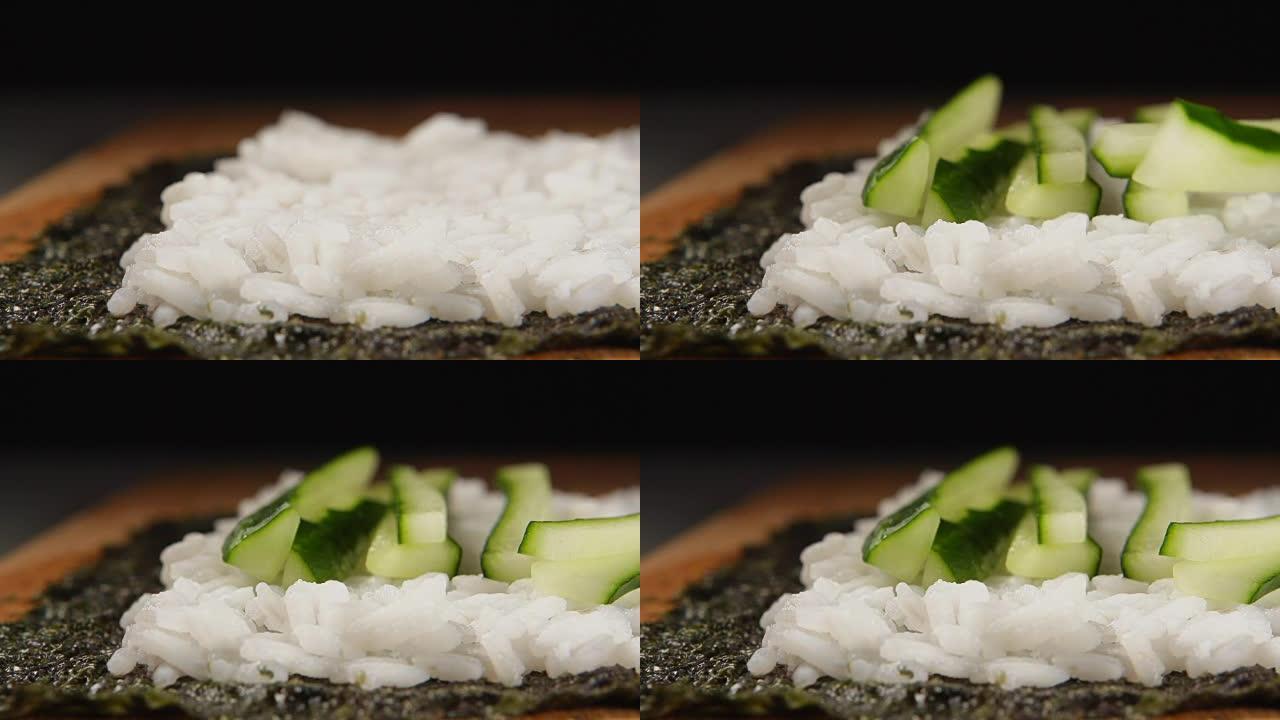 慢: 黄瓜条落在桌子上的米饭上