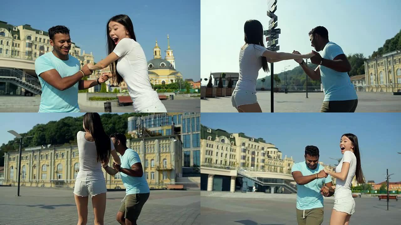 热情的亚洲女孩在城市背景下滑板