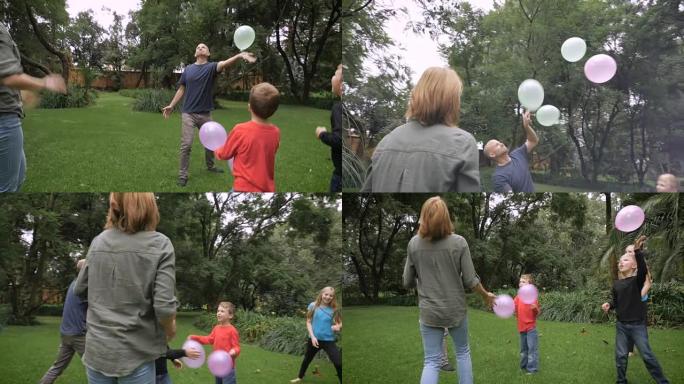 一家五口在公园里玩气球一天-slowmo