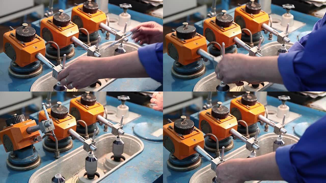 用于生产光学透镜的研磨机。研磨和抛光镜片。