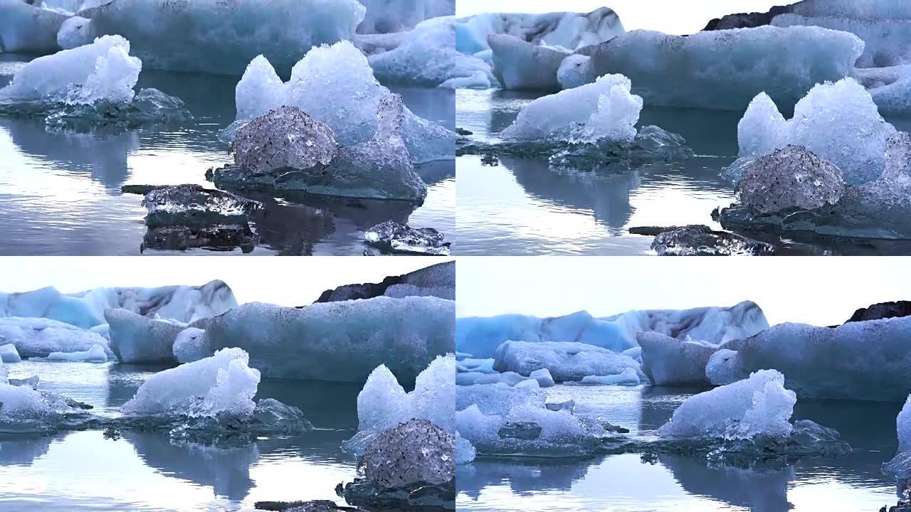 小片和大块的冰山漂浮在约库尔萨隆冰川泻湖中。全球变暖融冰问题