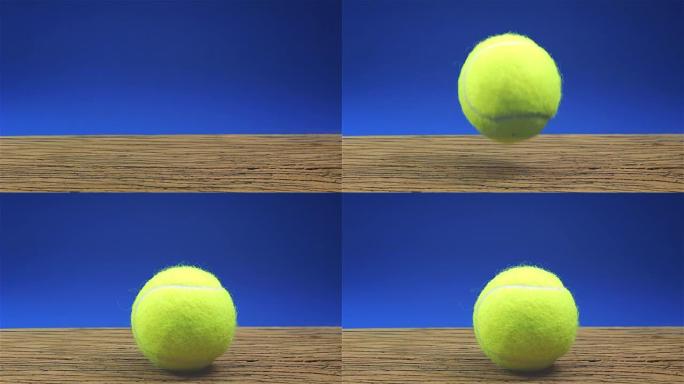 网球球在蓝色背景的木头上弹跳