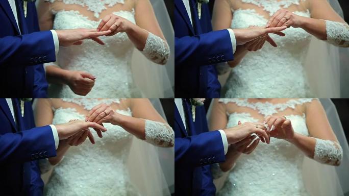 两个白人新郎和新娘交换结婚戒指