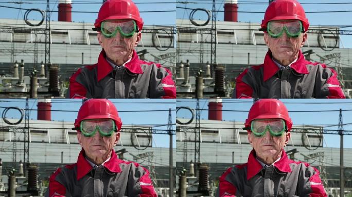 原子能发电厂戴着红色安全帽的工人