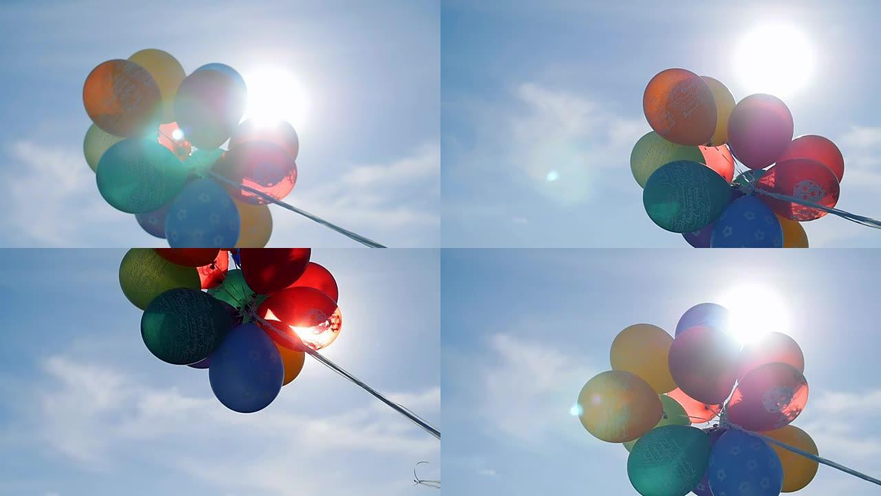 气球对着天空和太阳