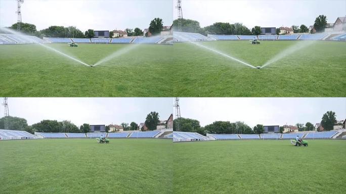洒水浇灌割草绿色足球场草地