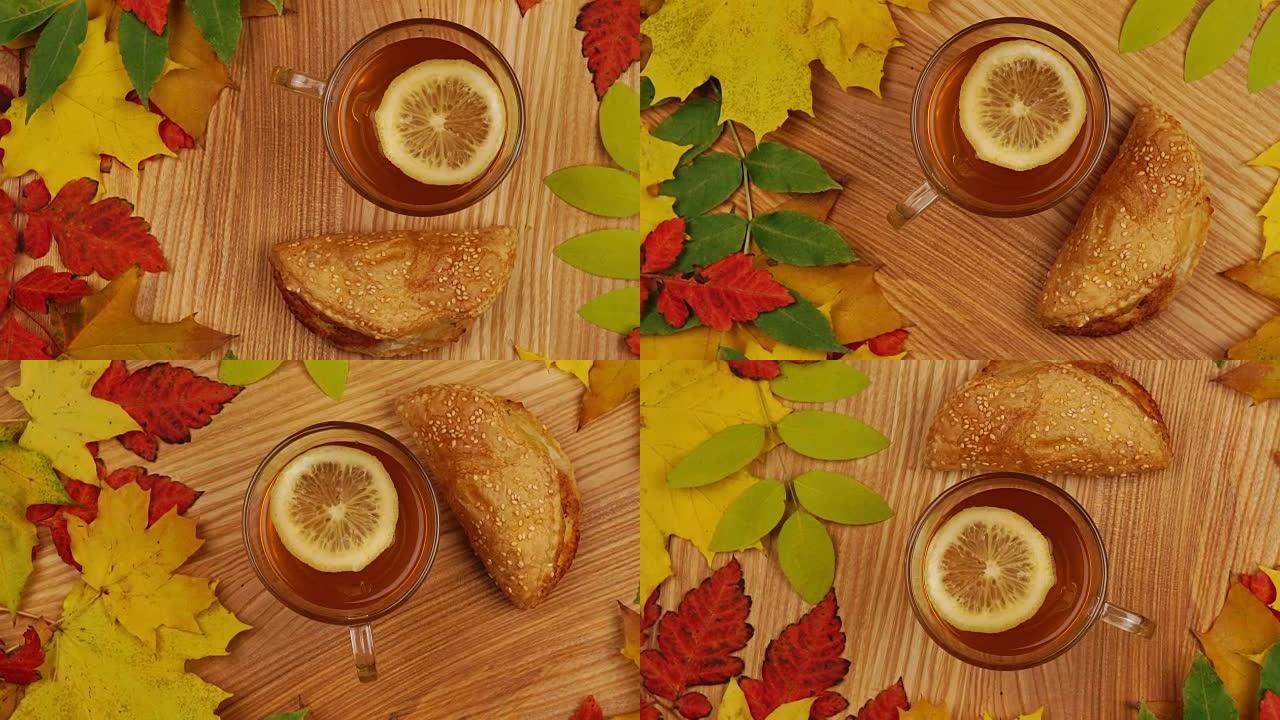 秋茶配柠檬片和羊角面包。