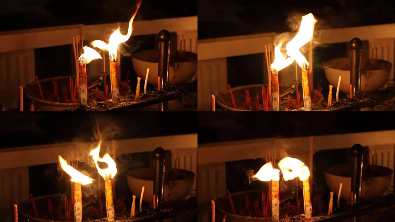 寺庙里的蜡烛和火