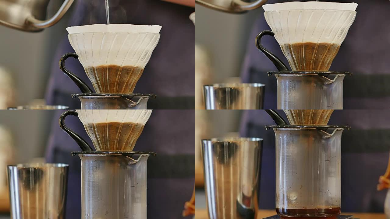 用滤纸把水倒在咖啡粉上