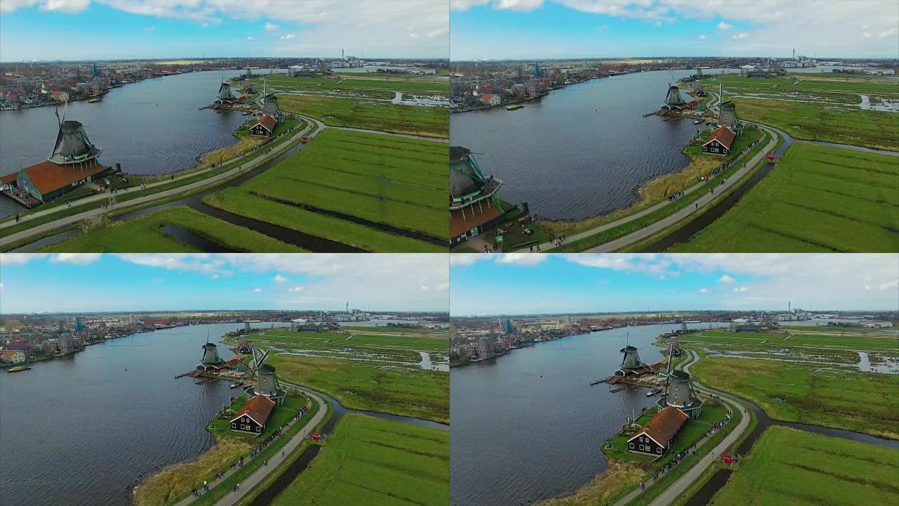 荷兰风车村，天桥陆地观景风车走向水面