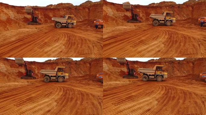 采矿卡车在沙矿移动。采砂场的采矿机械
